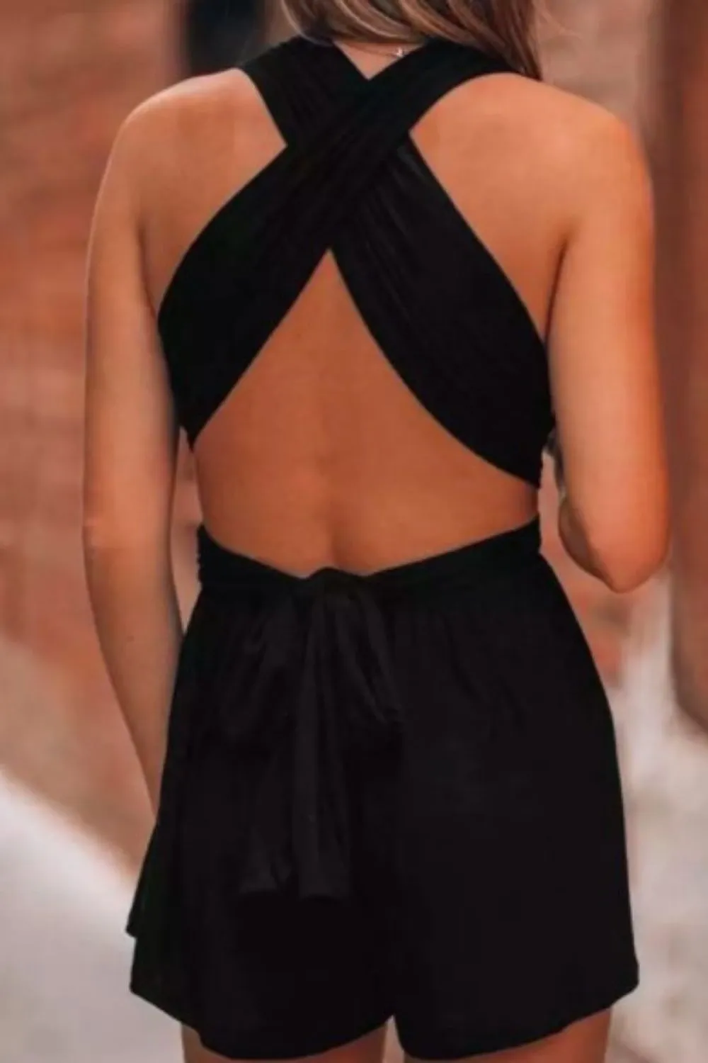 CrissCross Ruffled Halter 
Tie Open Back Romper In Black